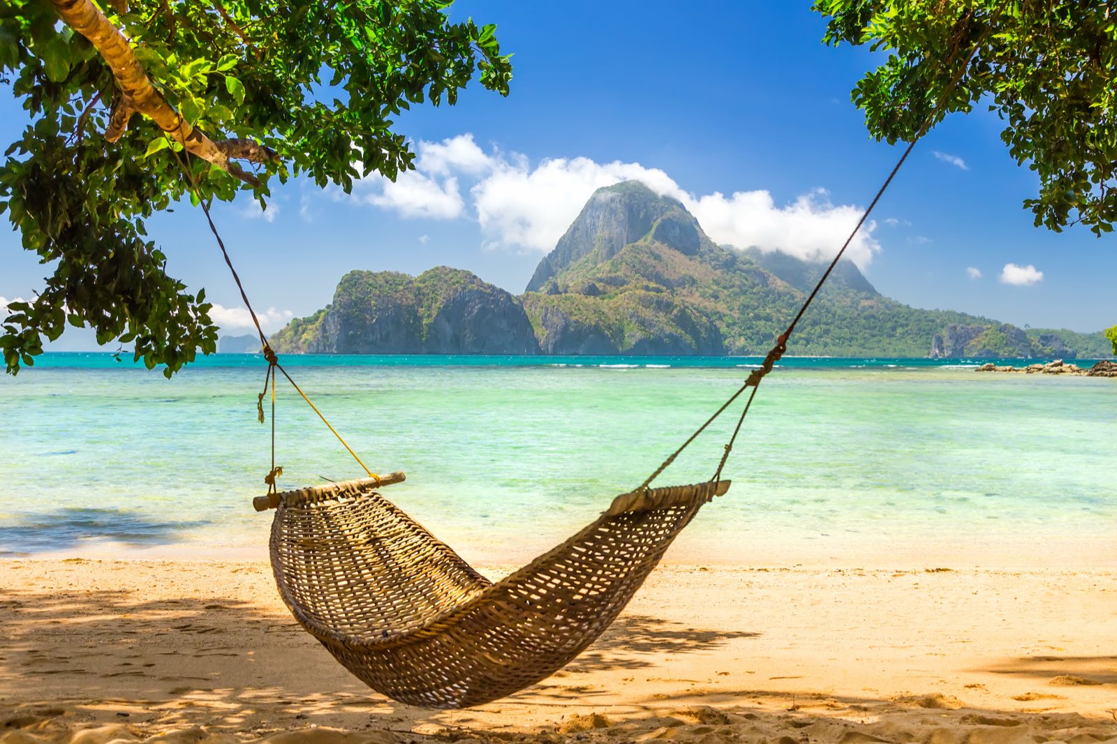 A hammock on a beach in El Nido, Palawan